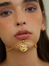 wearing Custom Bella Zodiac Sign Necklace